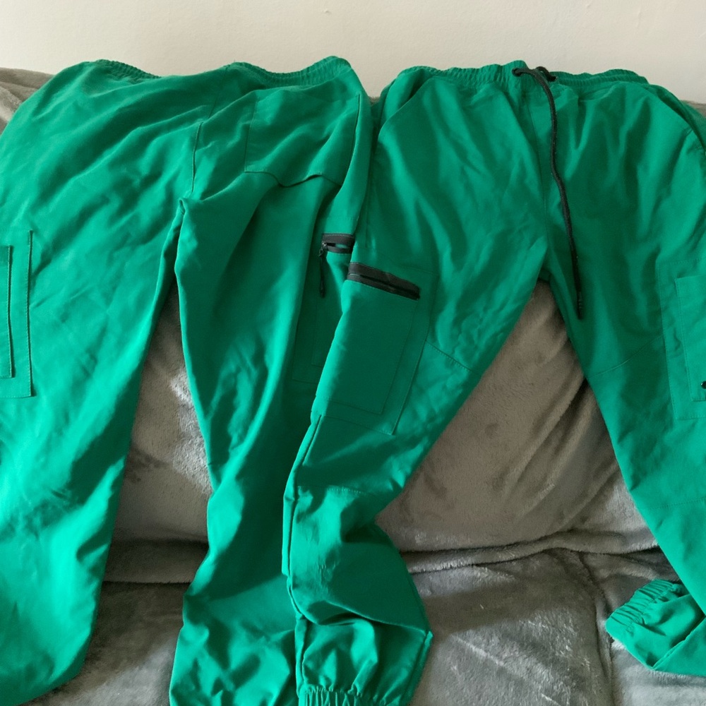 Green Cargo Joggers uniforms. Size small and medium fabric stretches to fit.